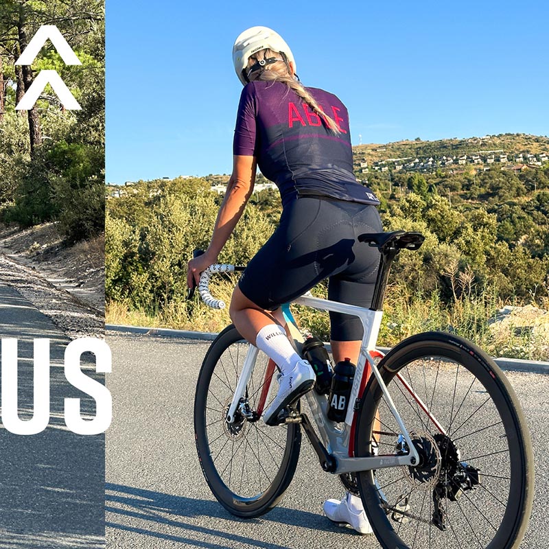 Anna Katrine cycling and wearing Willing Able
