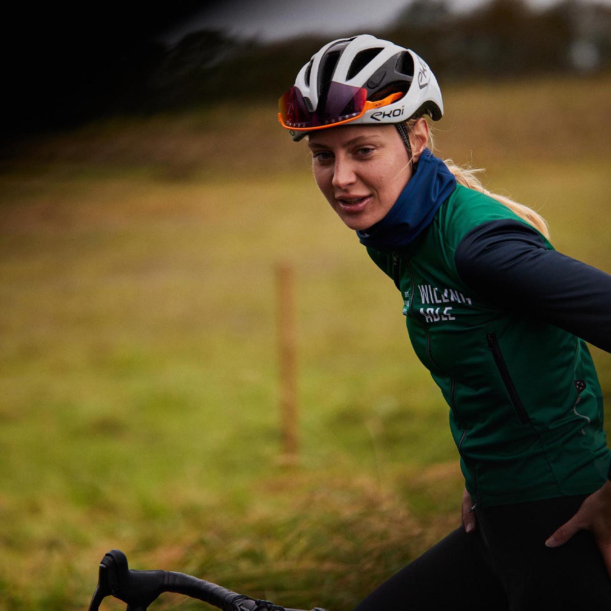 A cyclist from WeCycling, posing on their bike for a photo.