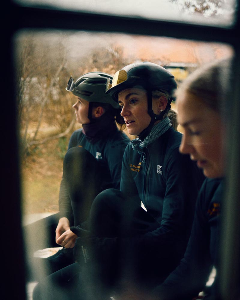 Photo of members of the WeCycling community sitting together.