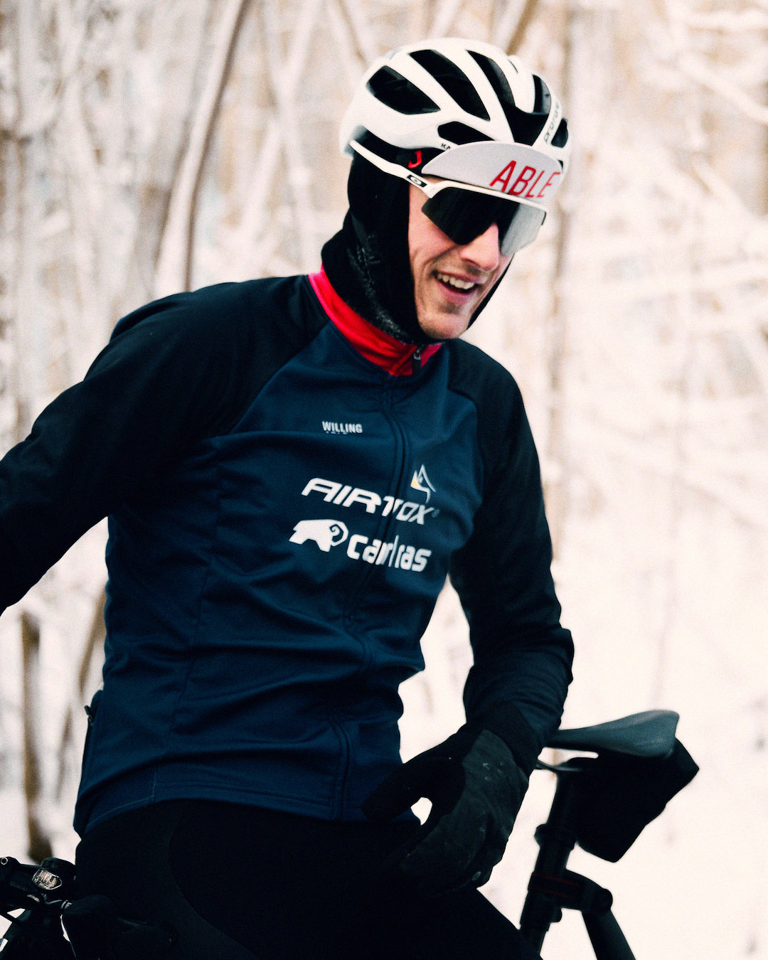 Photograph of cyclist from Team Airtox, wearing Willing Able apparel.
