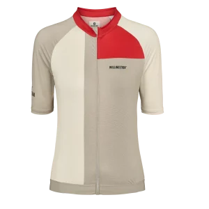 This Sandy SS W Jersey has a race-inspired fit with mesh ventilation, silicone grippers, and eco-friendly materials. colors are sandy and red.